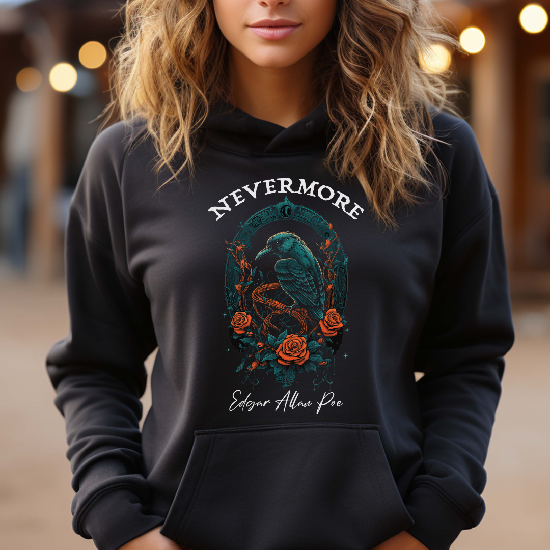 Young woman with long brown hair wearing a Edgar Allan Poe Nevermore hoodie with black raven and red roses created by Midnight Gypsy Designs apparel company.