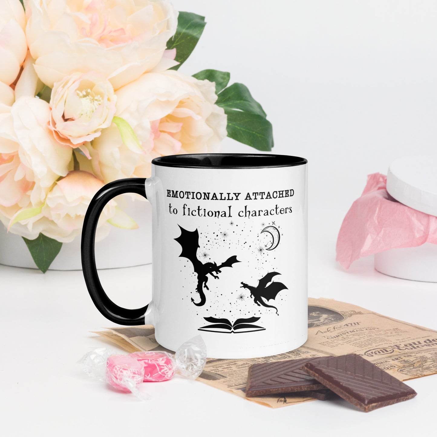 Black and white Emotionally attached to fictional characters mug with dragons and crescent moon created by graphic apparel company Midnight Gypsy Designs as part of their book merch collection. Perfect fantasy readers mug, book dragon mug and fourth wing mug for fantasy readers.