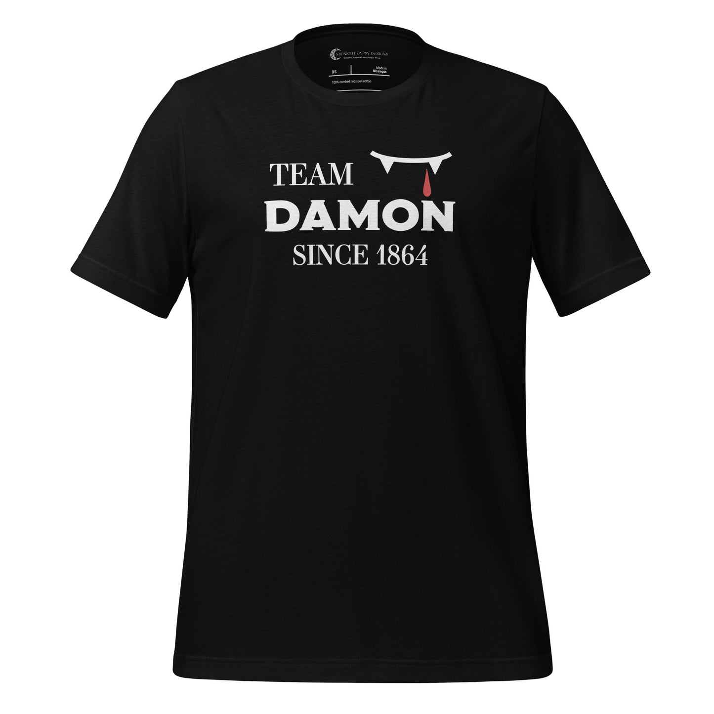 Black The Vampire Diaries Team Damon Since 1864 shirt with fangs and blood drip created by graphic apparel company Midnight Gypsy Designs. Perfect Team Damon shirt, Damon Salvatore shirt, the Vampire Diaries shirt, cute vampire shirt, team Damon apparel, Salvatore Brothers shirt, team Damon t-shirt, Mystic Falls shirt, and Mystic Falls t-shirt for fans of The Vampire Diaries!