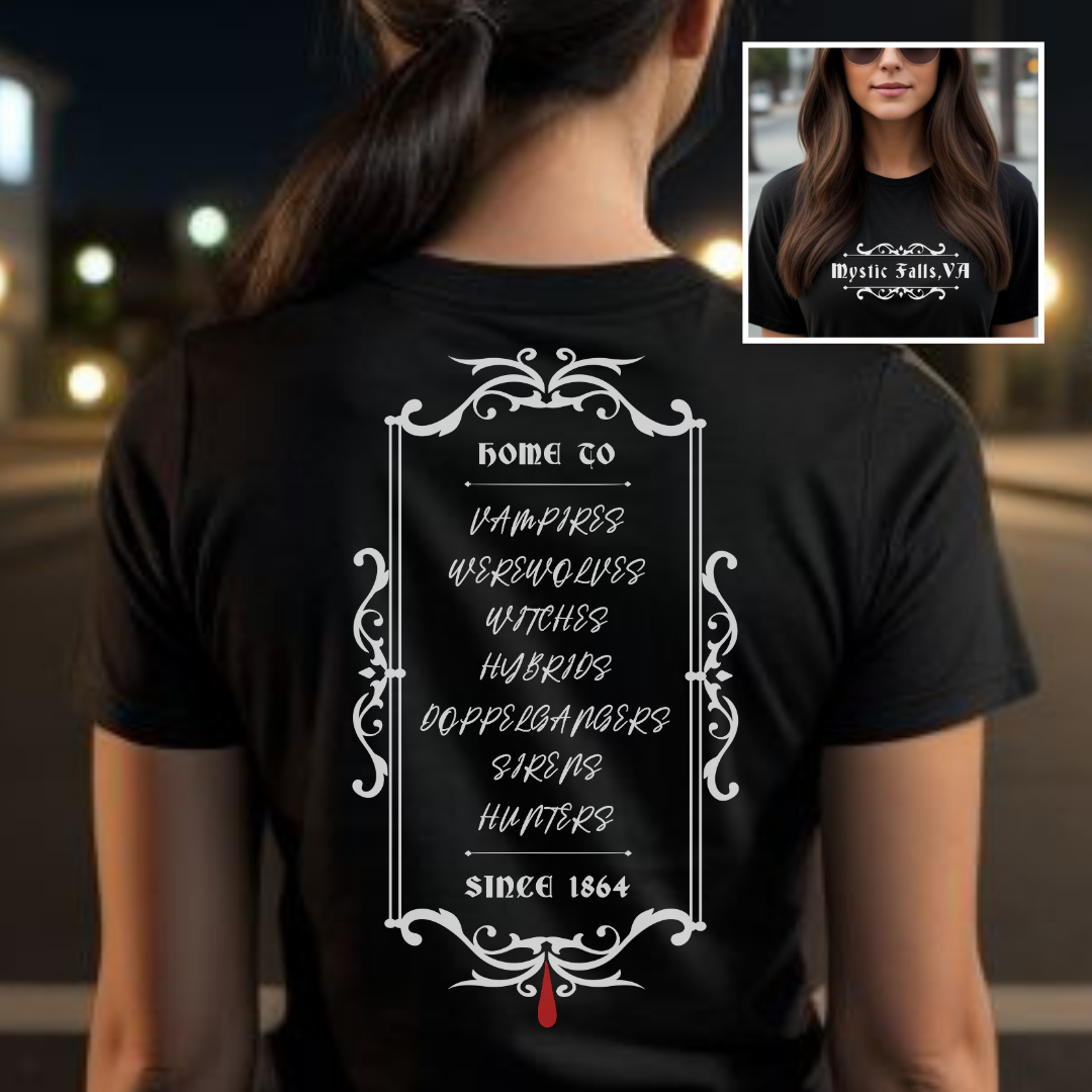 Young woman with long brown pony tail standing outside at night wearing a black Vampire Diaries t-shirt that reads Home to vampires, werewolves, witches, hybrids, doppelgangers, sirens, and hunters since 1864 with a red blood drip created by clothing apparel shop Midnight Gypsy Designs.