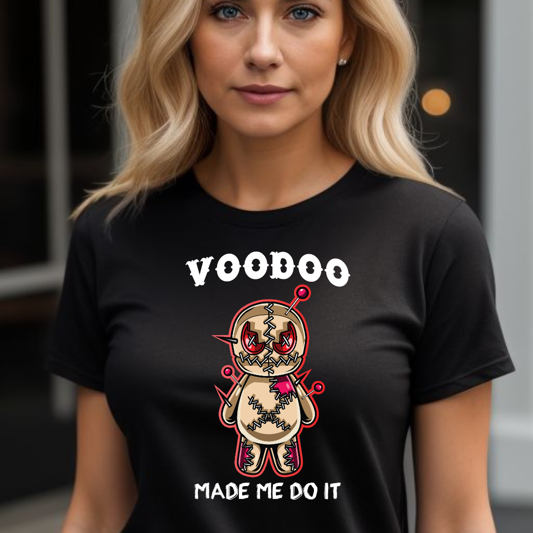Young woman with long blonde hair wearing a black VooDoo Made Me Do It New Orleans shirt with voodoo doll designed by graphic apparel company Midnight Gypsy Designs.