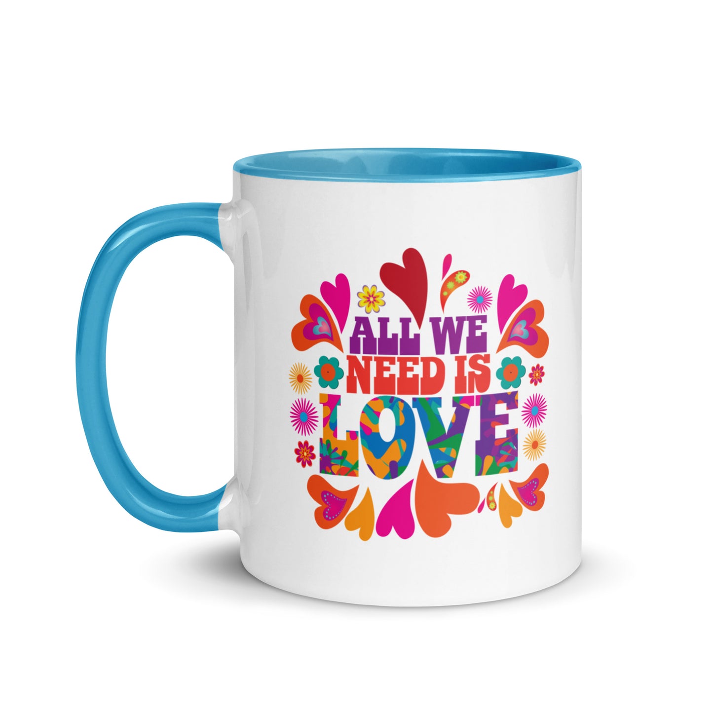 All we need is love coffee mug with blue handle and colorful hearts with 1960s hippie style created by clothing apparel company Midnight Gypsy Designs. Perfect mental health awareness mug, Valentine's Day mug, peace mug, flower child mug, and cute kindness mug.