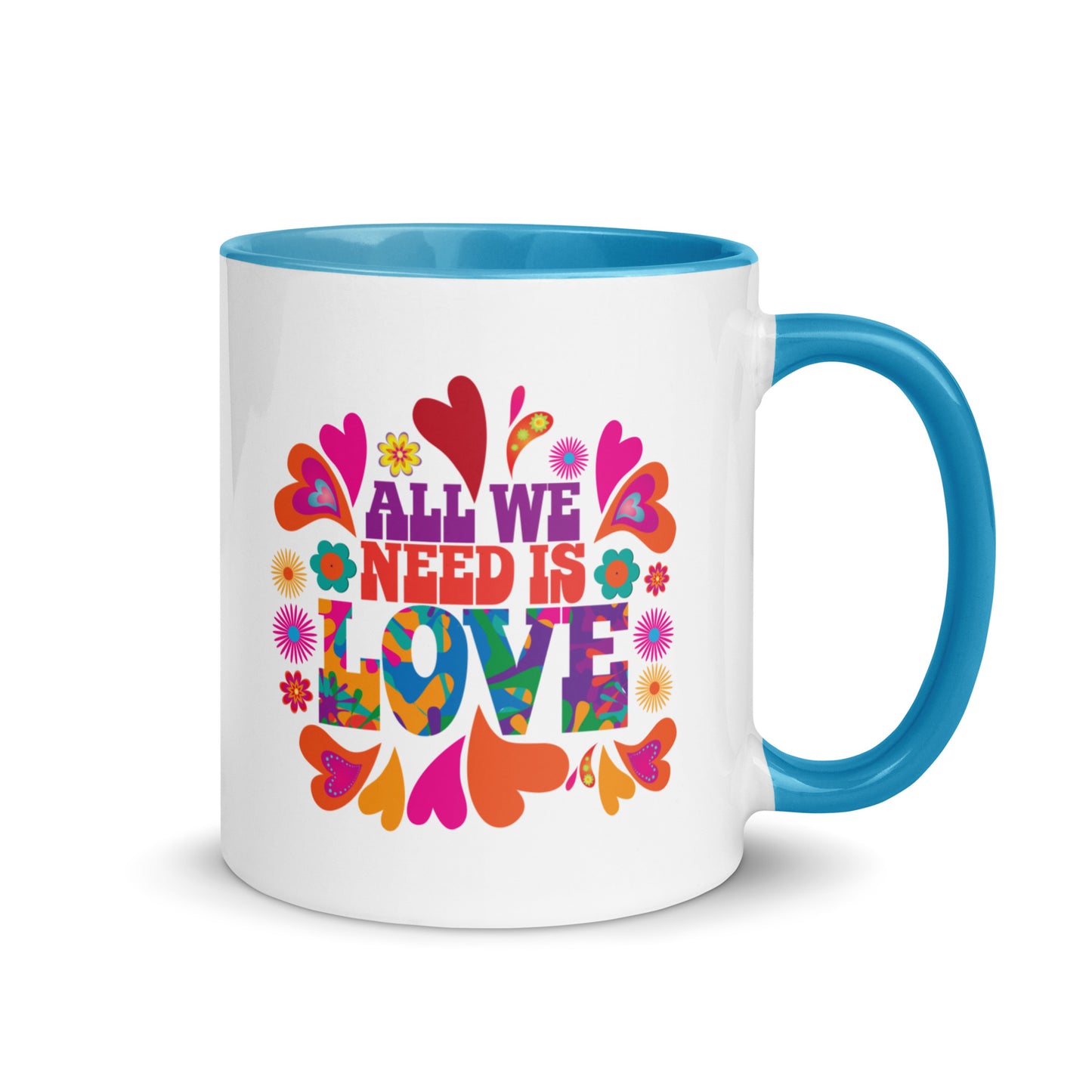 All we need is love coffee mug with blue handle and colorful hearts with 1960s hippie style created by clothing apparel company Midnight Gypsy Designs. Perfect mental health awareness mug, Valentine's Day mug, peace mug, flower child mug, and cute kindness mug.