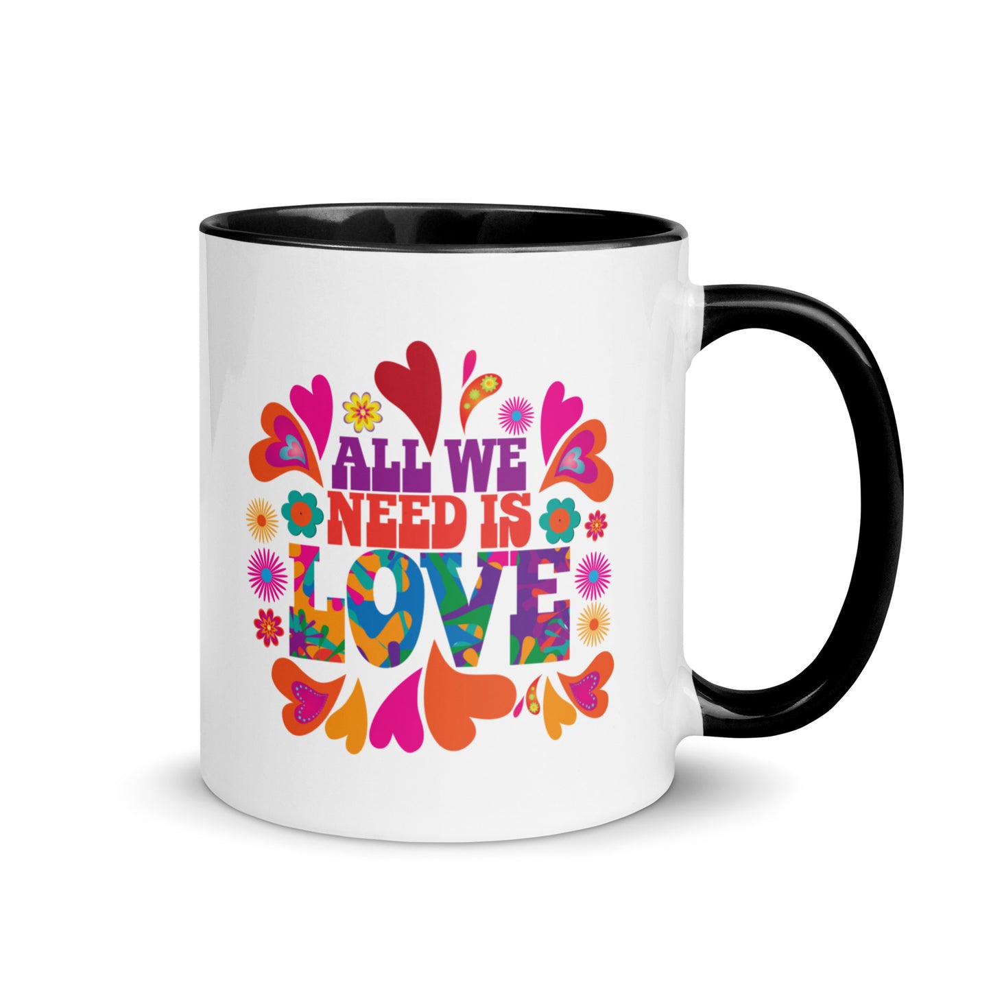 All we need is love coffee mug with black handle and colorful hearts with 1960s hippie style created by clothing apparel company Midnight Gypsy Designs. Perfect mental health awareness mug, Valentine's Day mug, peace mug, flower child mug, and cute kindness mug.