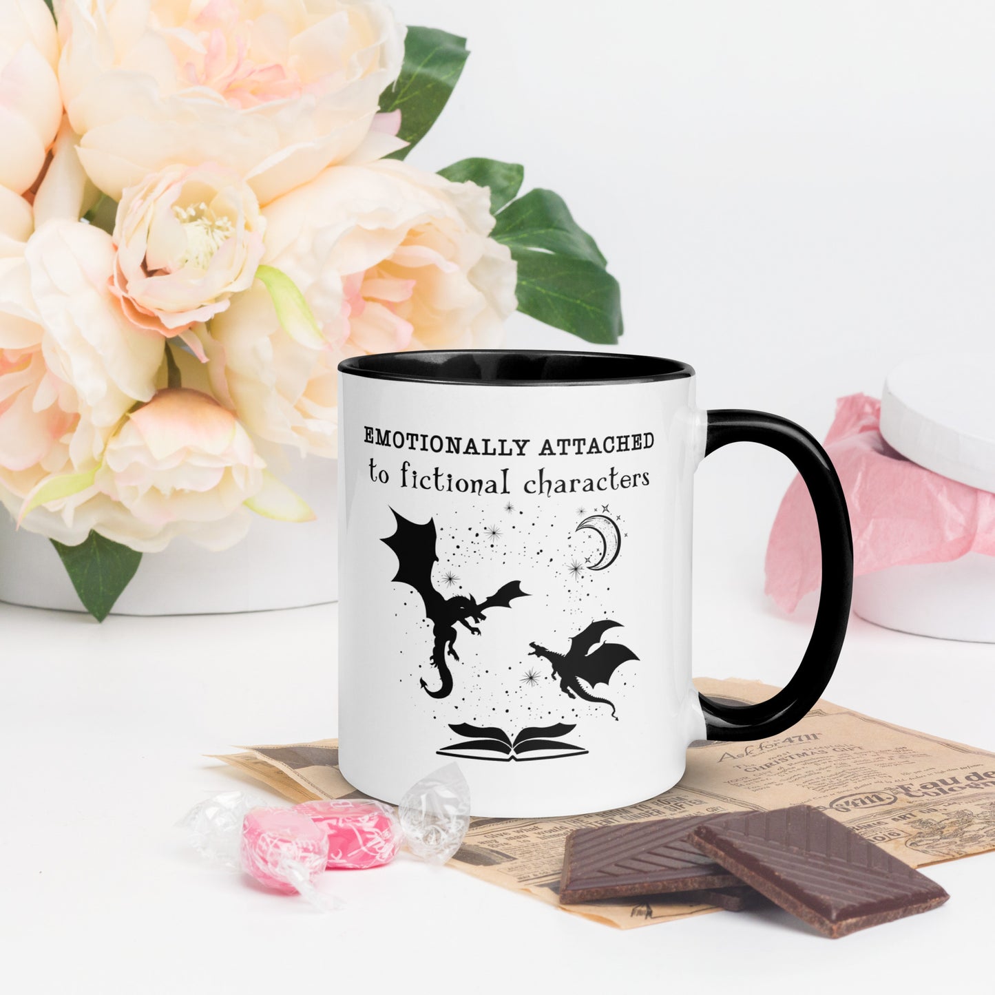 Black and white Emotionally attached to fictional characters mug with dragons and crescent moon created by graphic apparel company Midnight Gypsy Designs as part of their book merch collection. Perfect fantasy readers mug, book dragon mug and fourth wing mug for fantasy readers.
