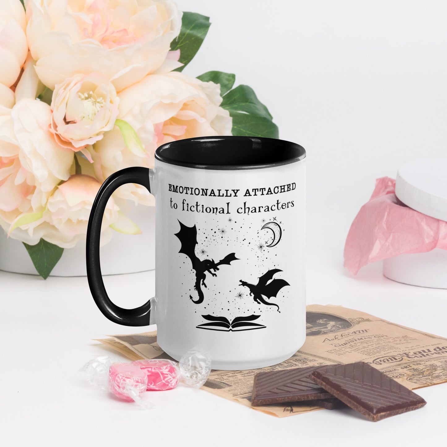 Black and white Emotionally attached to fictional characters mug with dragons and crescent moon created by graphic apparel company Midnight Gypsy Designs as part of their book merch collection. Perfect fantasy readers mug, book dragon mug and fourth wing mug for fantasy readers.