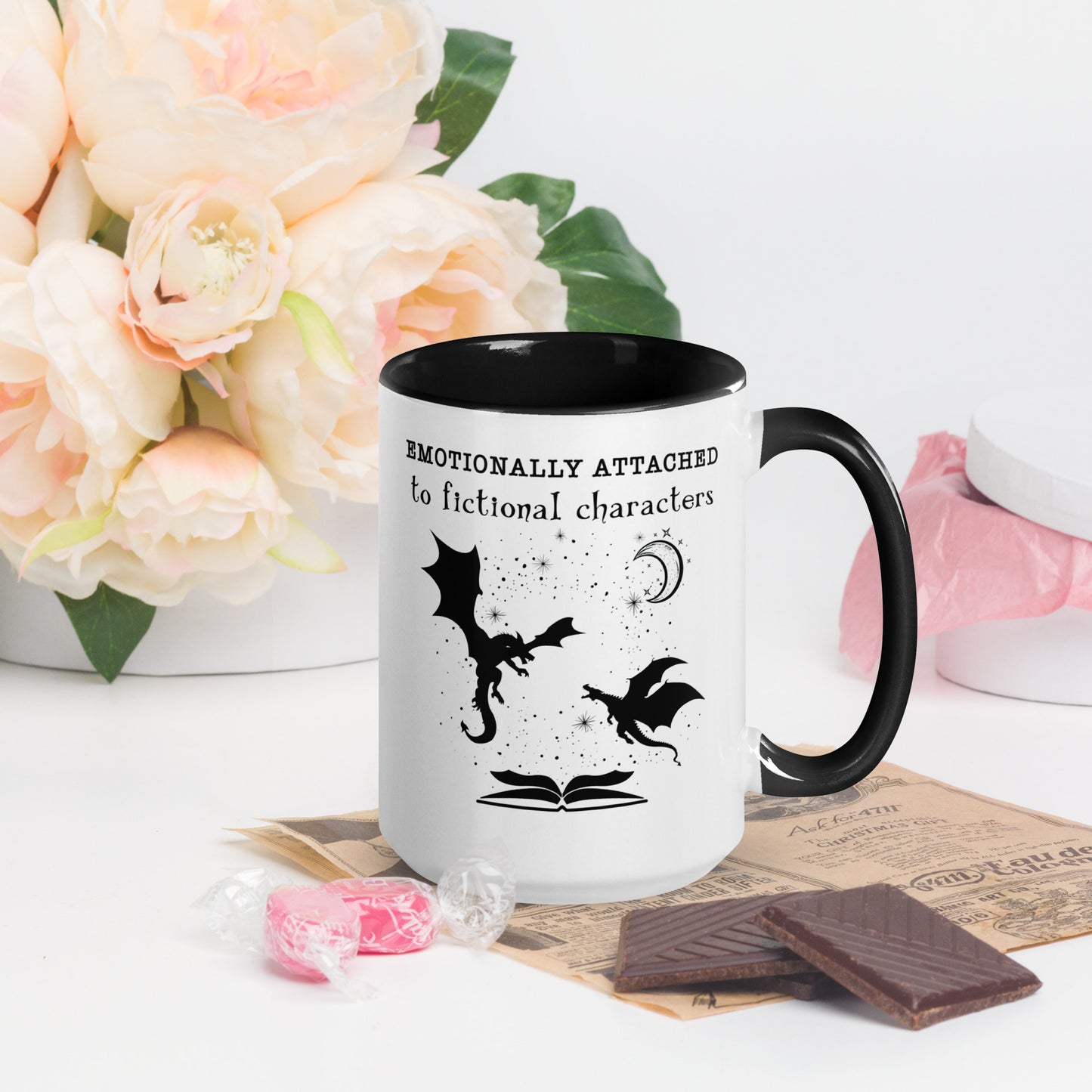 Black and white Emotionally attached to fictional characters mug with dragons and crescent moon created by graphic apparel company Midnight Gypsy Designs as part of their book merch collection. Perfect fantasy readers mug, book dragon mug and fourth wing mug for fantasy readers.
