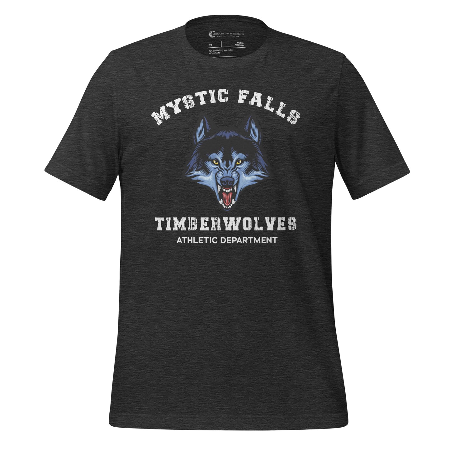 Dark grey Mystic Falls Timberwolves shirt with a blue werewolf showing its fangs created by graphic apparel company Midnight Gypsy Designs as part their The Vampire Diaries merch collection. Perfect The Vampire Diaries shirt, Mystic Falls shirt, Mystic Falls Timberwolves t-shirt, Stefan Salvatore shirt, Stefan Salvatore t-shirt, Stefan Salvatore tee, Stefan Salvatore 17 shirt, Mystic Falls High School shirt, Team Stefan shirt, Damon Salvatore shirt, and Team Damon Shirt.