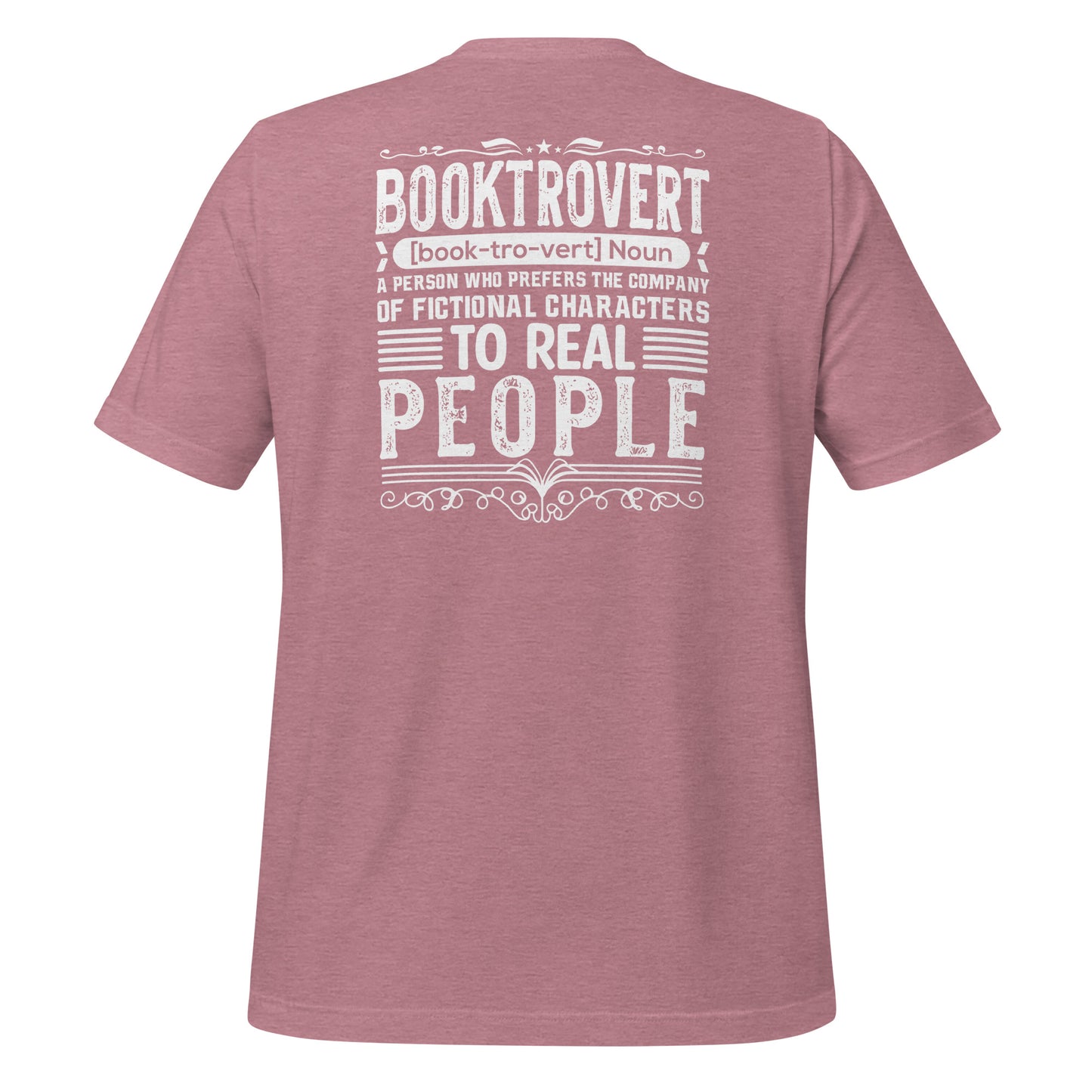 Pink booktrovert definition shirt in bold white letters created by graphic apparel company Midnight Gypsy Designs as part of their bookish merch clothing line.