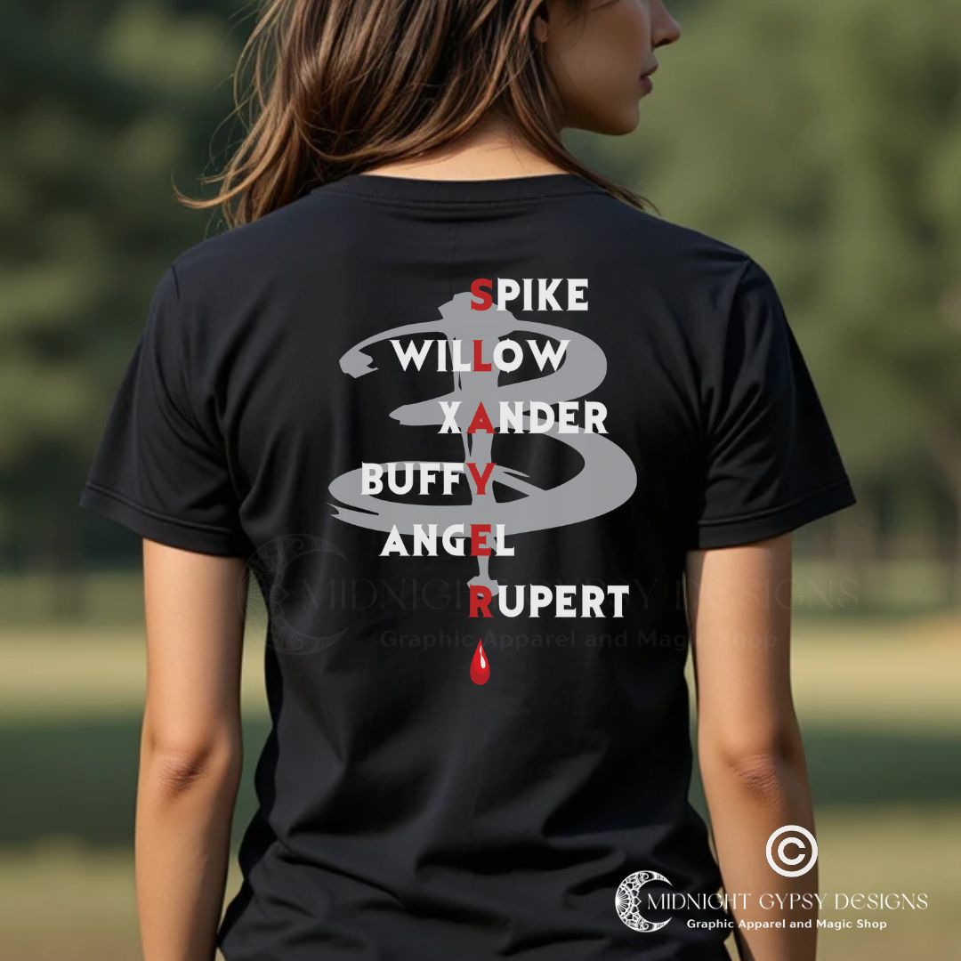 Young woman with brown hair standing outside wearing a Scooby Gang Buffy the Vampire Slayer T-shirt with the character names Spike, Willow, Xander, Buffy, Angel, and Rupert on the back with the word Slayer in red and a red blood drip created by fandom graphic apparel company Midnight Gypsy Designs as part of their Buffy the Vampire Slayer clothing line.