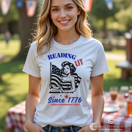 Woman with blonde hair wearing a Reading Lit Since 1776 patriotic t-shirt with  an American flag created by graphic apparel company Midnight Gypsy Designs as part of their patriotic apparel line. Perfect fourth of July shirt.