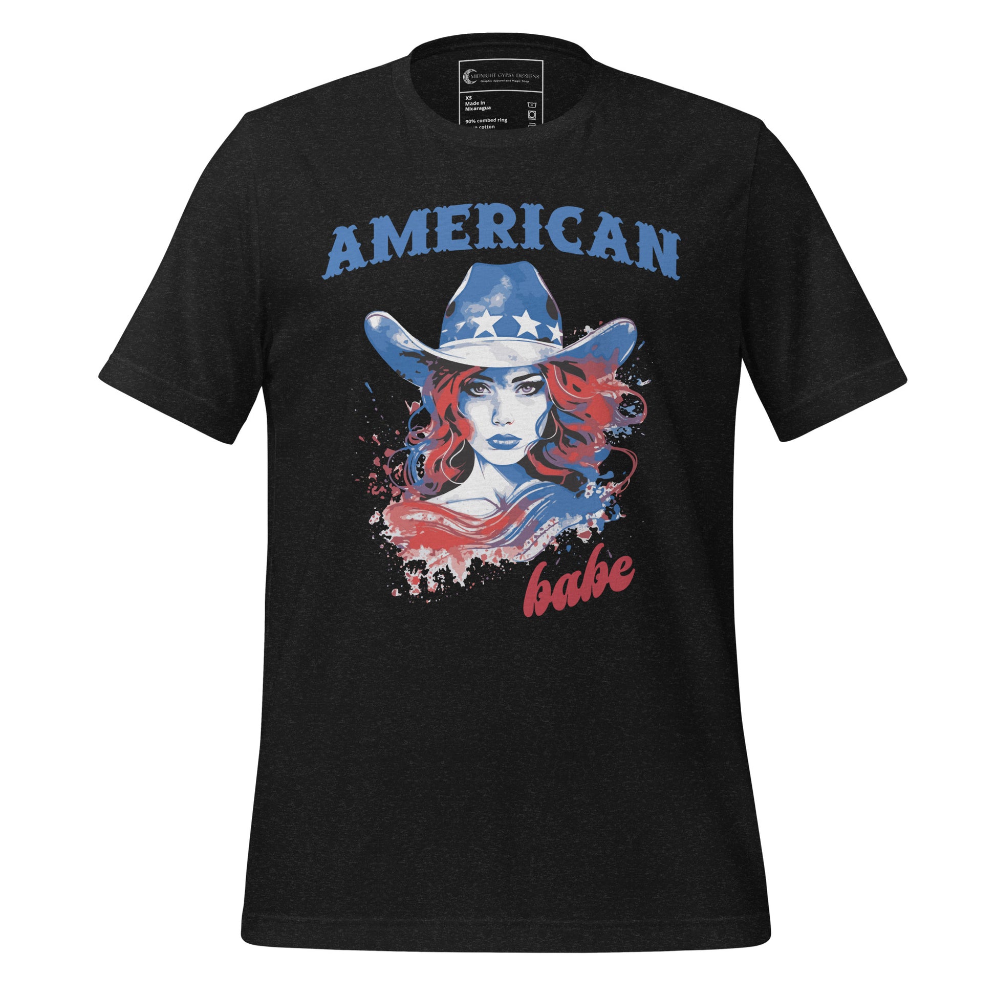 A black Western American Babe shirt that has a woman in a blue cowboy hat with white stars. Created by graphic apparel company Midnight Gypsy Designs as part of their patriotic apparel clothing line. Perfect USA patriotic shirt, fourth of July shirt for women, and American pride shirt.