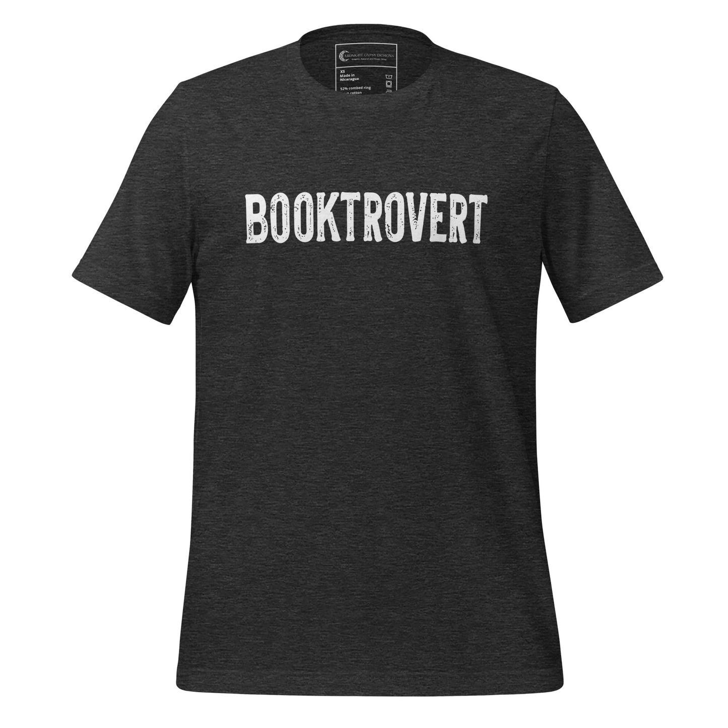 Heather grey booktrovert definition shirt in bold white letters created by graphic apparel company Midnight Gypsy Designs as part of their bookish merch clothing line.