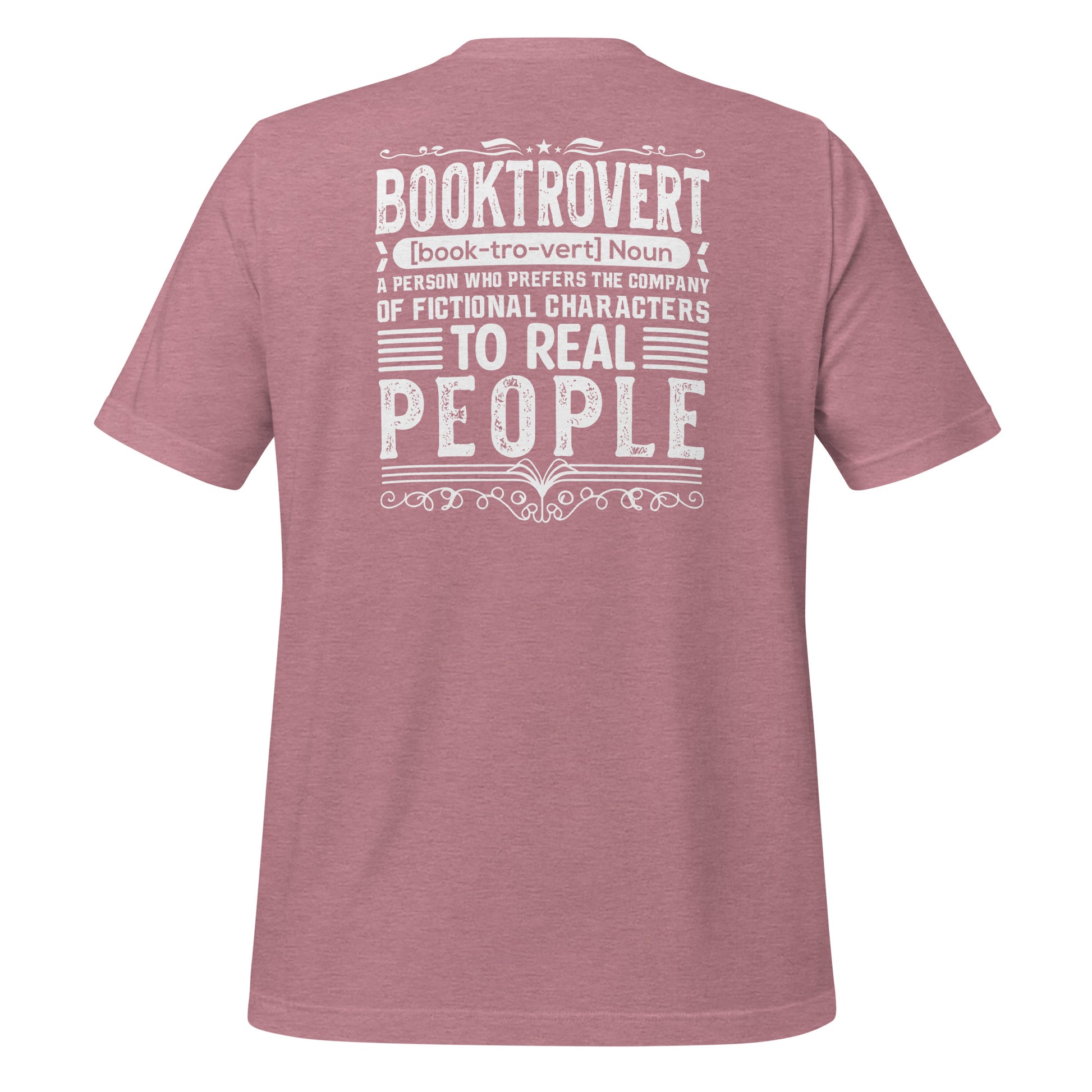 Pink booktrovert definition shirt in bold white letters created by graphic apparel company Midnight Gypsy Designs as part of their bookish merch clothing line.
