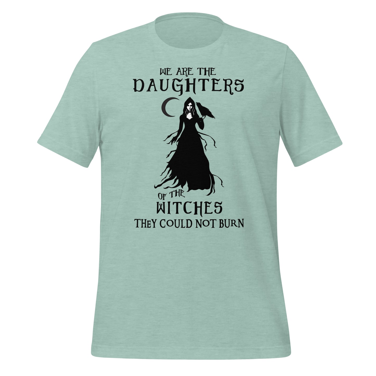 Heather prism dusty blue t-shirt with black lettering that reads We Are the Daughters of the Witches They Could Not Burn with the moon and a witch in long black gown with a crow on her arm from apparel shop Midnight Gypsy Designs.