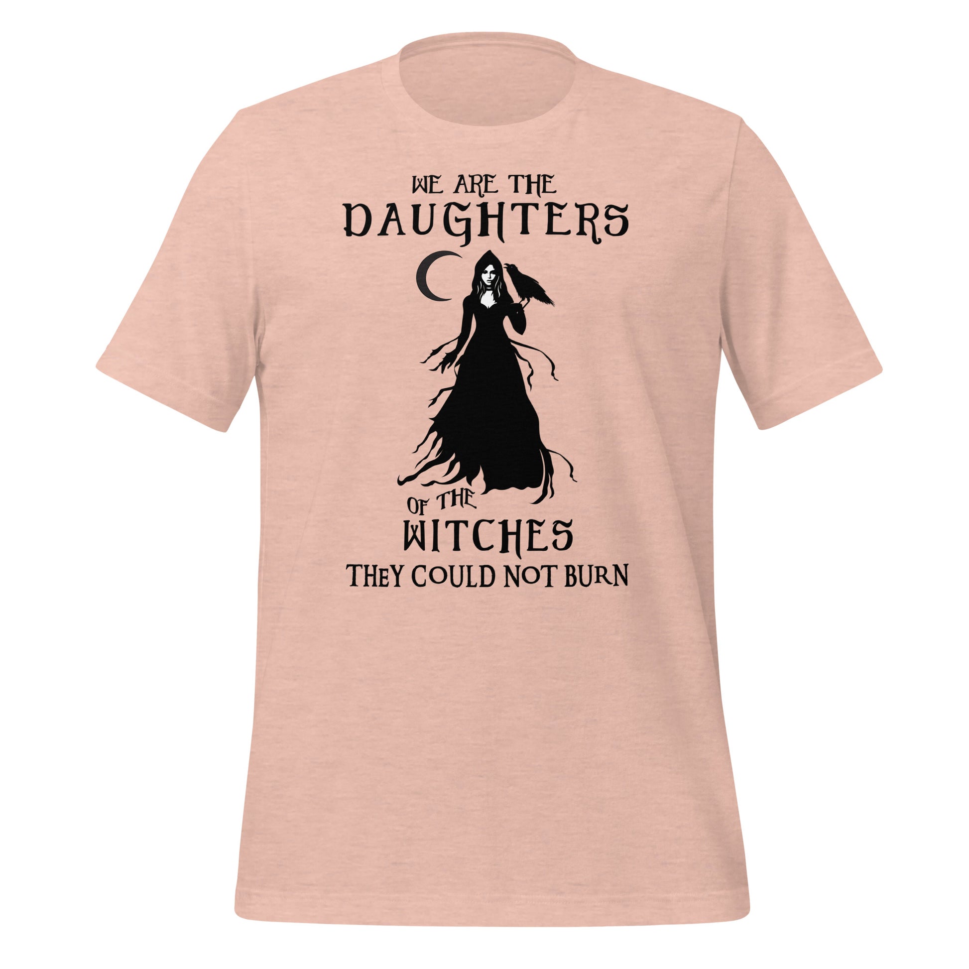 Heather prism peach t-shirt with black lettering that reads We Are the Daughters of the Witches They Could Not Burn with the moon and a witch in long black gown with a crow on her arm from apparel shop Midnight Gypsy Designs.